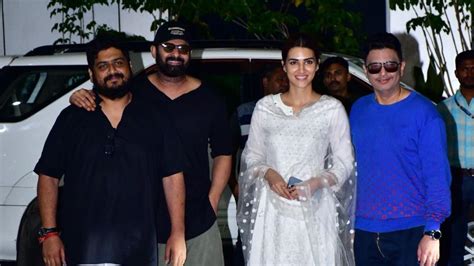 Kriti Sanon, Prabhas are all smiles as they arrive in Mumbai for ...