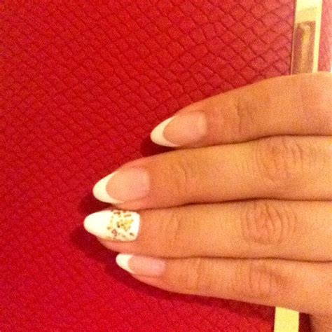 Somewhat of a V French tip White. Gold. Accent nail. Ring finger. | Gold accent nail, Accent ...