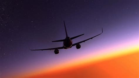 Premium Photo | Comercial airplane flying over the amazing sunset