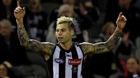 Report: Injury-plagued Collingwood star Jamie Elliott has re-signed ...