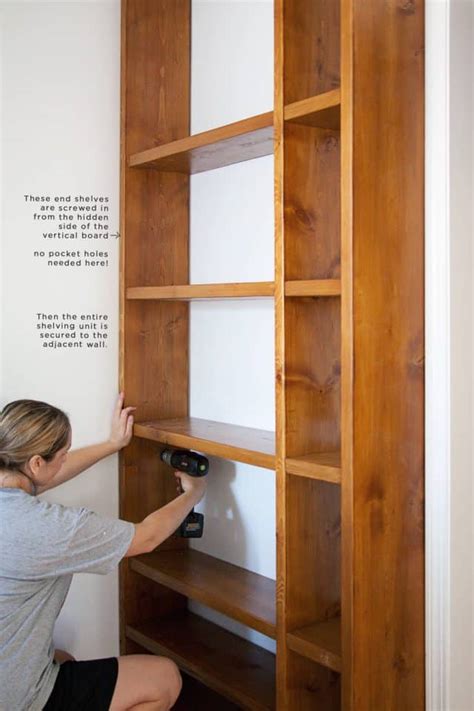 DIY Wood Shelving Wall - A Beautiful Mess