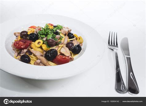 Spaghetti with Mediterranean tuna, capers, olives, Sicilian chil Stock ...