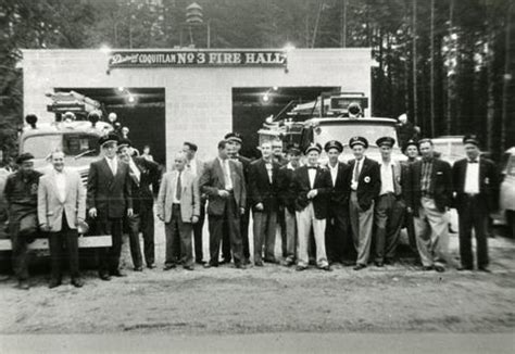 Members of Coquitlam's volunteer fire department pose in front of the No. 3 firehall - ARCHIVES