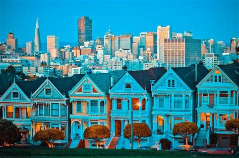 Premium Photo | Famous painted ladies of san francisco, california sit glowing amid the backdrop ...