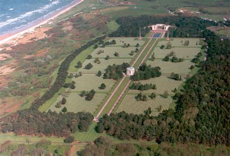 Aerial view showing the Normandy American Cemetery, overlooking Omaha Beach.