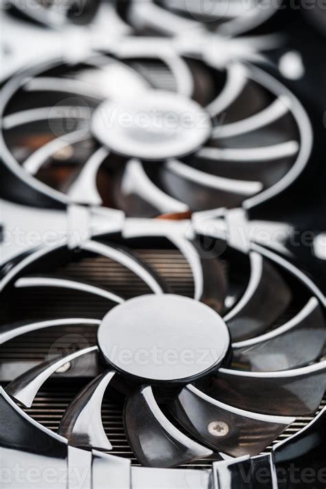 A video card with three fans is hardly a powerful cooling system ...