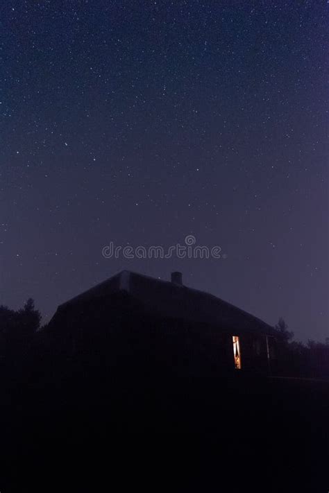 Silhouette of House Under Starry Sky in Night Stock Image - Image of evening, dark: 268089679