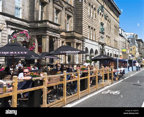 dh GEORGE STREET EDINBURGH Street outdoor restaurants Edinburgh New Town people city cafe ...