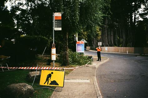 Bus stop sign, Men at Work sign | Photographed using the Han… | Flickr