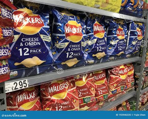 Packets of Walkers Crisps on the Shelves in a Supermarket of London. Editorial Image - Image of ...