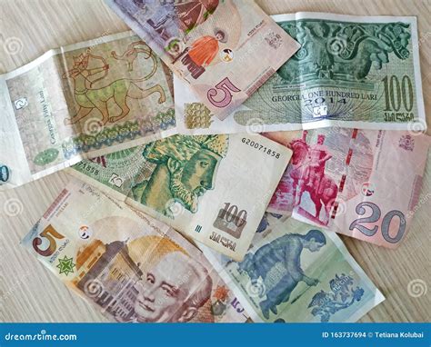 On the Table are Georgian Lari Banknotes of Various Categories. Stock Photo - Image of economic ...