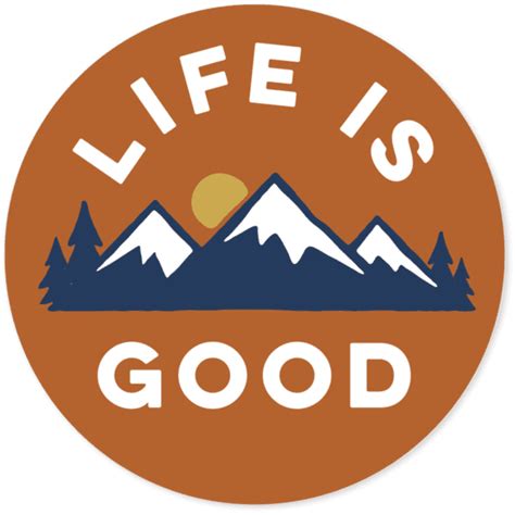 an orange circle with the words life is good on it and mountains in the ...