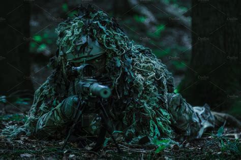 Sniper wearing ghillie suit containing soldier, army, and military | People Images ~ Creative Market