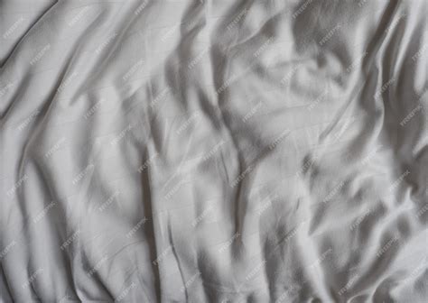 Premium Photo | White bed sheet cotton fabric texture background