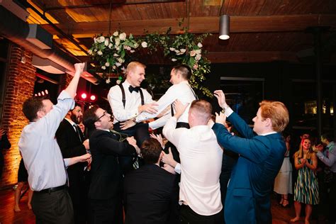 Grooms During Hora at Wedding Reception