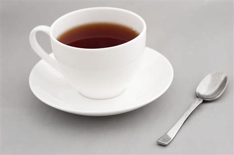 Generic white cup of hot black tea - Free Stock Image