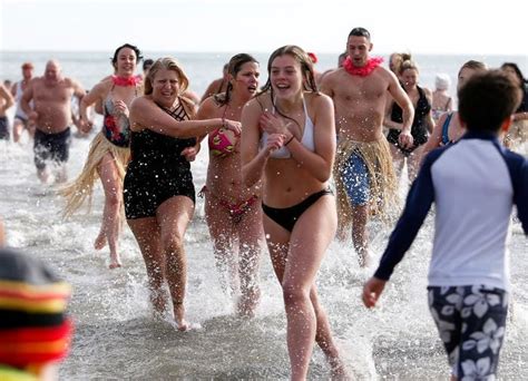 Hundreds take a polar plunge across N.J. to celebrate the New Year. See ...