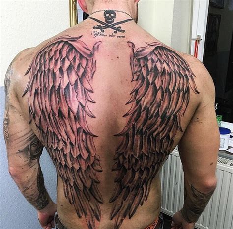 Pin on Tattoos | Back tattoos for guys, Wing tattoos on back, Angel wings tattoo on back