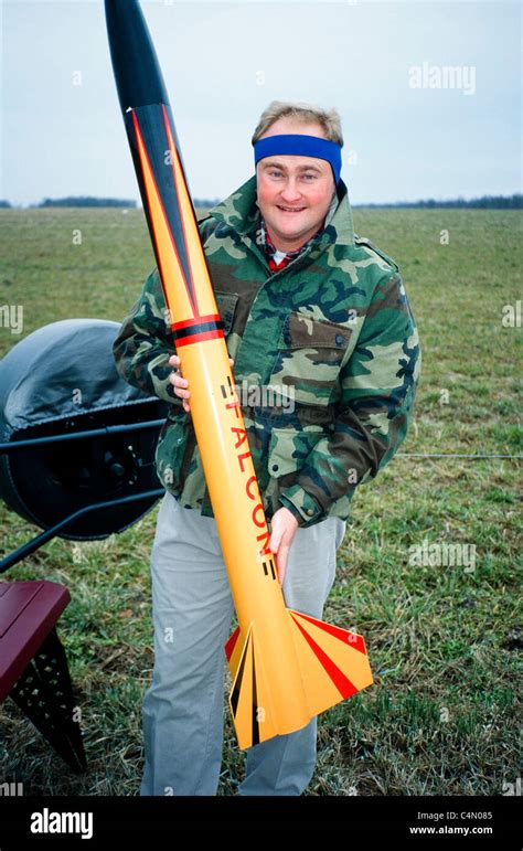 A rocketeer shows of his homemade rocket launch at an amateur rocket festival. Manchester ...