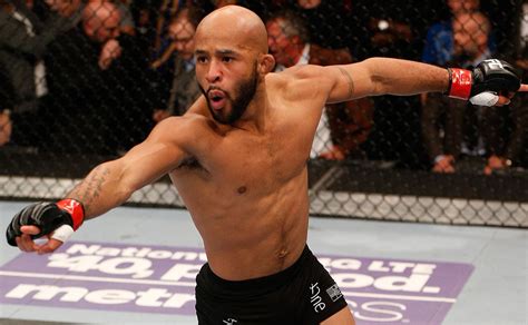 Demetrious Johnson wins at UFC 174 for fourth straight title defense ...