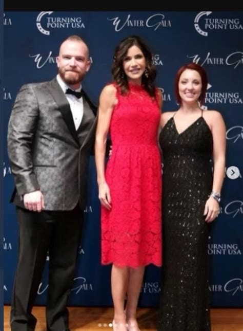 PHOTO Kristi Noem At Trump Mar-A-Lago Christmas Party In Bright Red Dress