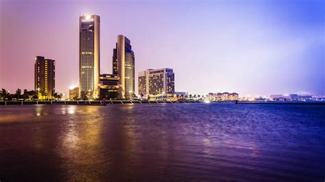 Corpus Christi City Skyline at Night in Texas - Cityscape | Root, a part of Accenture