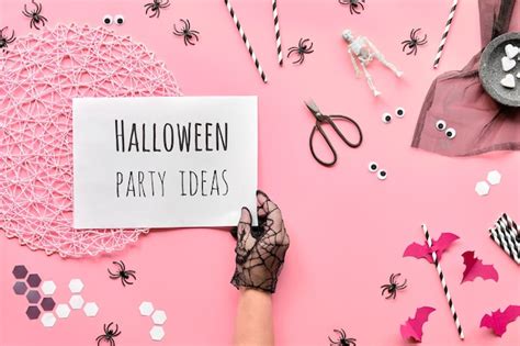 Premium Photo | Halloween flat lay with scissors and decorations on ...