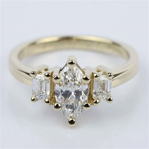 Three-Stone Emerald Engagement Ring with Marquise Diamond