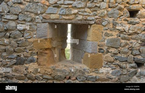 loophole into the stone walls of a medieval castle Stock Photo - Alamy