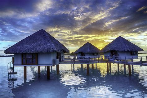 Overwater Bungalows in Bora Bora at Sunset Photograph by Mel Ashar | Fine Art America