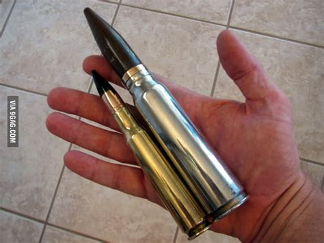 The small bullet is a .50 BMG, the larger one is the 20MM rifle round ...