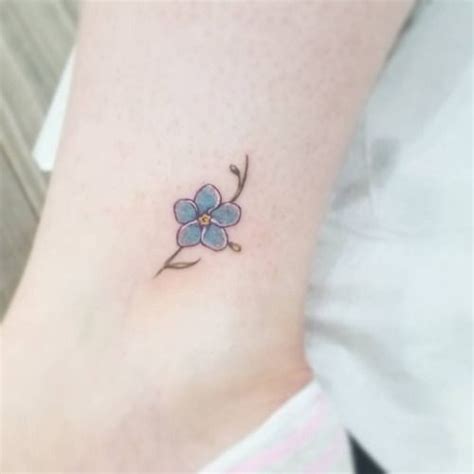 simple forget me not flowers tattoo | Tiny flower tattoos, Small tattoos, Beauty tattoos