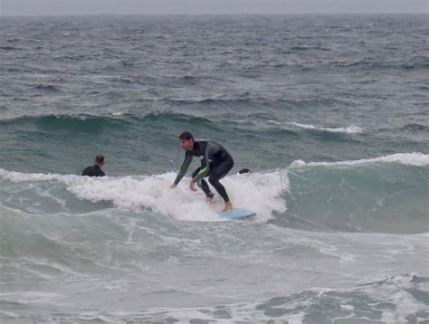 Tonel showing two different faces, - Surf Guide Algarve