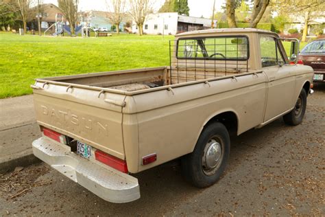 OLD PARKED CARS.: 1972 Datsun 1600.