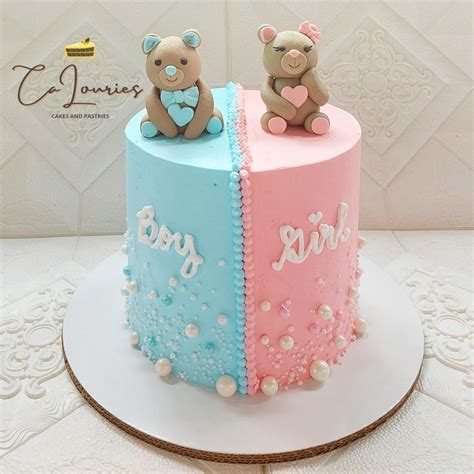 Gender reveal cake (half pink half blue with edible toppers) | Gender ...