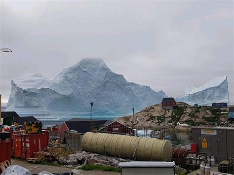 Massive Iceberg Threatens Greenland Village