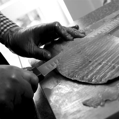 Tim of The Artisan Smokehouse hand-slicing a side of smoked salmon Artisan Food, Smoked Food ...