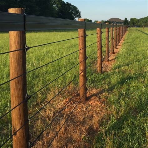 This electric fence has 1400 pounds of break strength per rail and is ...