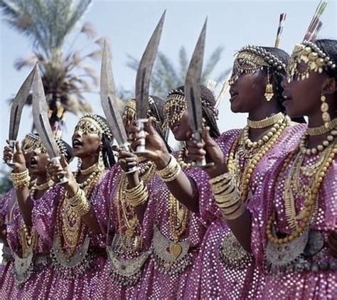 The Afar women of Djibouti performing a traditional sword dance African ...