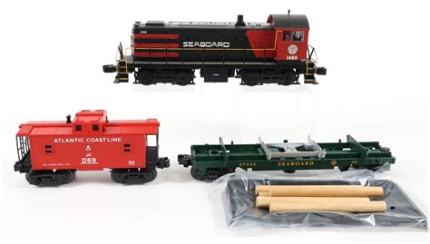 Lot Detail - LIONEL O GAUGE MODEL TRAINS LOCOMOTIVE & CARS