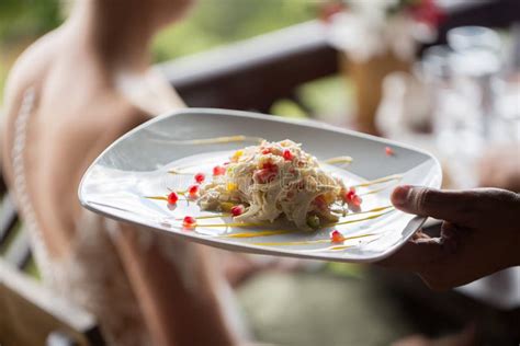 A Waiter with a Plate of Salad. Millionaire Mauritius Stock Photo - Image of cuisine, banquet ...