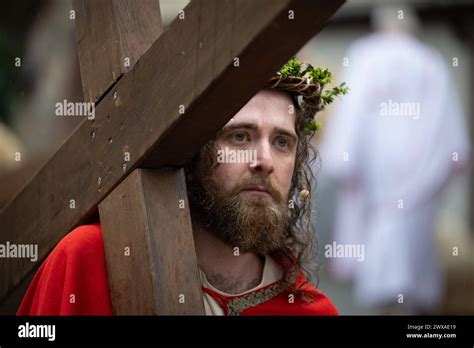 29 March 2024, Hesse, Bensheim: Amateur actors act out Jesus' Way of ...