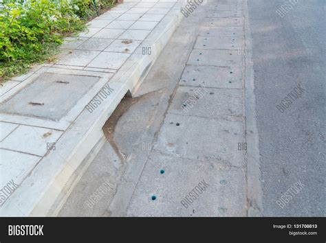 Drain Gutter Road, Next Pavement Image & Photo | Bigstock