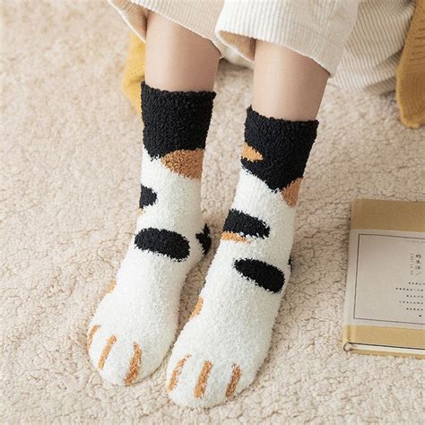 These Cute Cat Paw Socks are perfect for the cat lover in your life. They come in a variety of ...