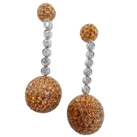 De Grisogono beads earrings, set with diamonds and orange sapphires. at 1stdibs