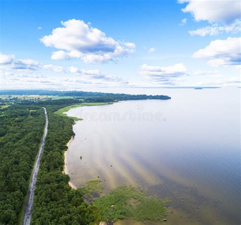 Aerial View of Highway. Aerial View of a Country Road Near the Lake. Car Passing by. Aerial Road ...