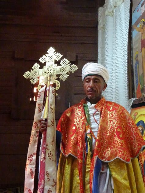 Ethiopian Orthodox priest holding a cross | Orthodox priest, Priest, Orthodoxy