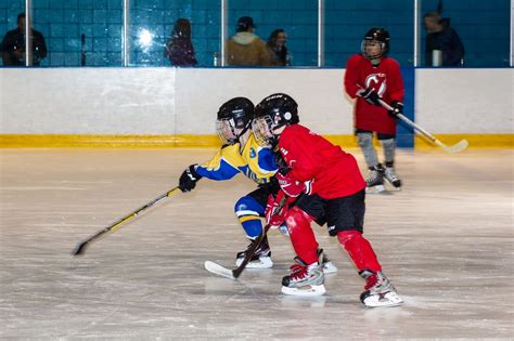 Skating in the barn. Kids get a chance to try hockey at Mennen Sports ...