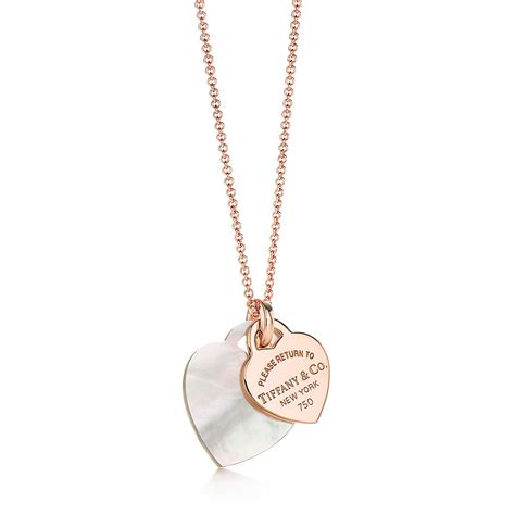 Return to Tiffany™ small double heart tag pendant in mother-of-pearl and 18k ros | Tiffany & Co.