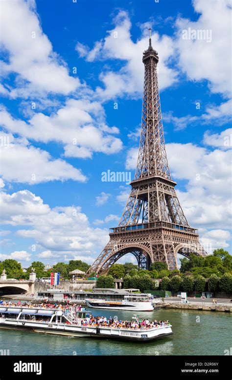 Bateaux Mouches tour boat on River Seine passing the Eiffel Tower, Paris, France, Europe Stock ...